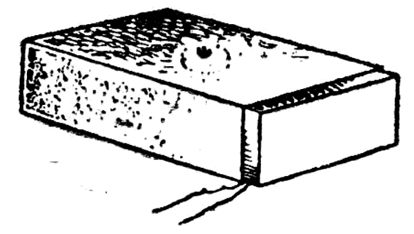 FIG. 1  - Caixa de fósforos usada como microfone.
