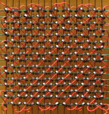 Figura 5 - Memória de ferrite – cana anel de ferrite armazenava 1 bit
Figura 5 - Memória de ferrite – cana anel de ferrite armazenava 1 bit
