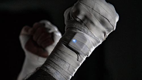 O sensor de golpes usado pelos lutadores nas olimpíadas.
